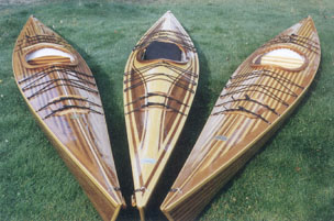 Three of oru custom-made kayaks